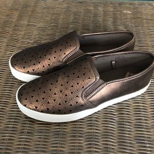 Gold slip on shoes